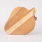 back view of strawberry shaped wooden trivet