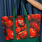 model holding Large canvas tote bag with cheerful cherry print and says 'CHERRY GOOD TIMES'