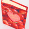 top view of realistic cherry photo album with gold foil 'photo album' across the front