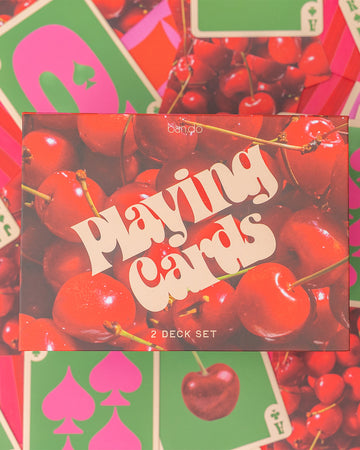 Interior of packaged set of 2 cherry print playing card decks