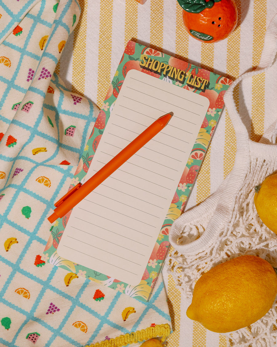 Magnetic shopping list notepad with colorful fruit illustration