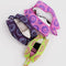 set of three 3D zip set pouches: pink with blue smiley, deep purple with light blue smiley, and yellow with hot pink smiley with items inside