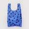 blue baby baggu with dark blue polka dots