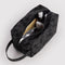 charcoal grey dopp kit with black ditsy floral with items inside
