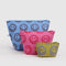 set of 3 go pouch set: small yellow with periwinkle smiley, medium hot pink with bright smiley, and large light blue with brown smiley
