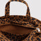 opened top of brown leopard horizontal zip duck bag