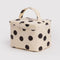 cream large cosmetic case with black polka dots