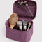 wild plum large cosmetic bag with items inside