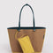 brown reversed side of tote with yellow trim and yellow removable tote