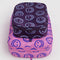 set of two packing cubes: medium deep purple with light blue smiley print and large pink with cobalt smiley print
