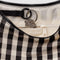 up close of interior key leash of black and cream gingham medium crescent bag