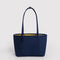 reversible navy tote with yellow interior