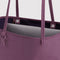 up close of reversible wild plum tote with dark purple interior