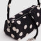 key leash of black and cream polka dot nylon loaf bag