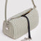black interior key leash of sage green and white vertical stripe nylon loaf bag