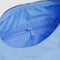 interior pouch of light blue meringue bag with thick twist strap