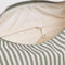 interior pouch of green and white vertical stripe meringue bag with thick twist strap