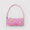 bright pink pochette bag with melting gold star print