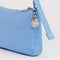 smiley charm on light blue pochette bag