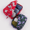 set of 2 packing cubes: small butterflies and medium lamb with items inside