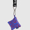 cobalt puffy earbud case with red smiley face print hanging from a black and white lanyard
