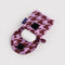 pink houndstooth puffy earbud case with earbuds inside