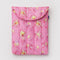 pink 13 in. laptop sleeve with gold melting star print