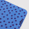 opened blue polka dot puffy picnic blanket
