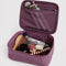 interior of wild plum small cosmetic case with hygiene items inside