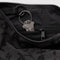 interior key leash of charcoal grey small crescent bag with black ditsy floral