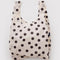 cream standard baggu with black polka dots