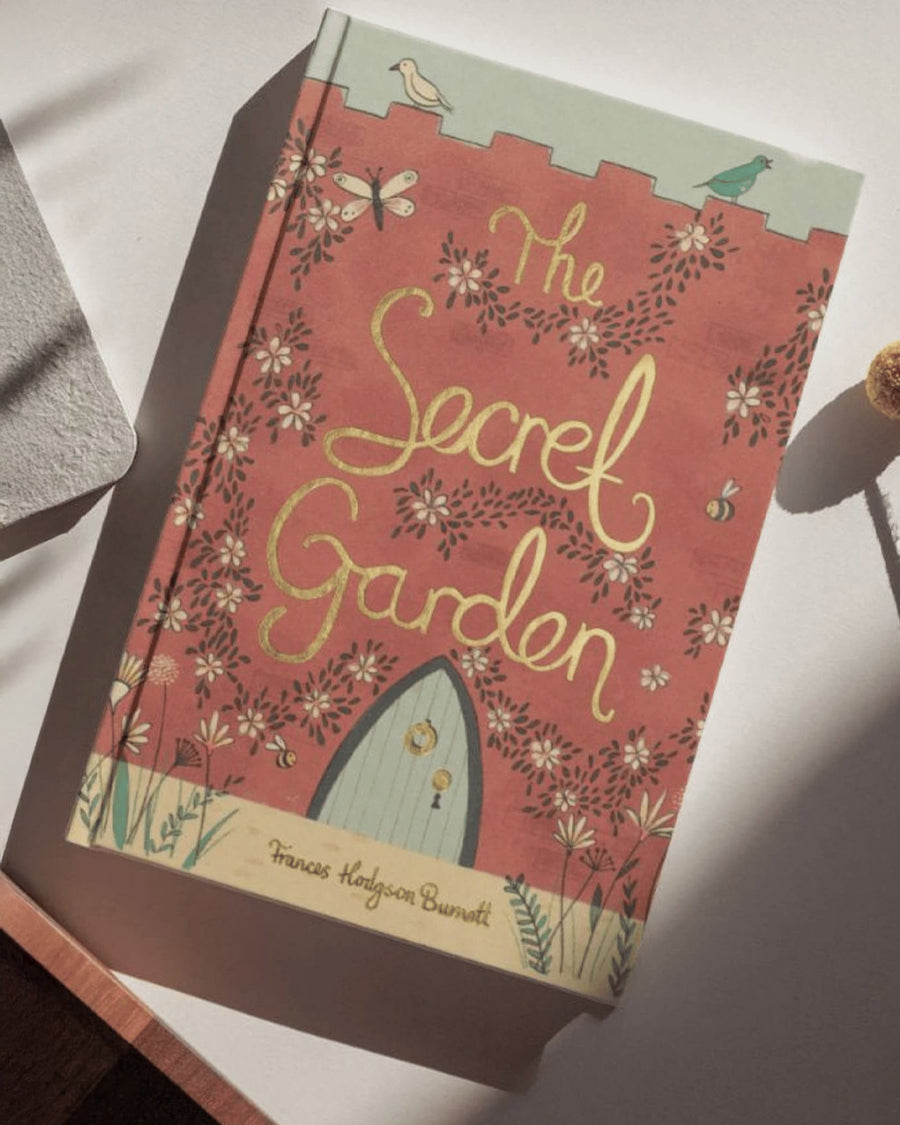 the secret garden book on a table