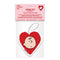 reverse side of red heart shaped air freshener with snoopy head on one side and charlie brown on the other