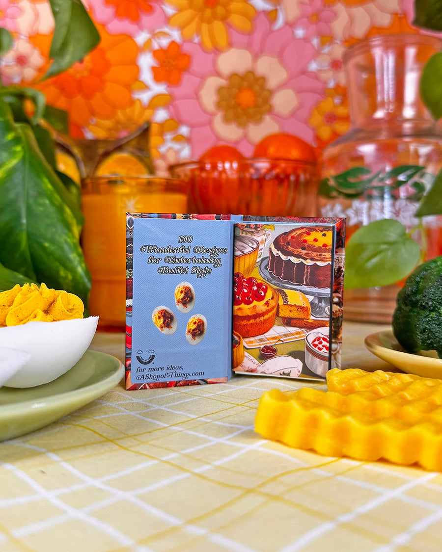 interior 'pages' of preparing buffet cookbook matchbook