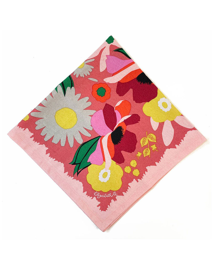 pink napkin with colorful abstract floral print