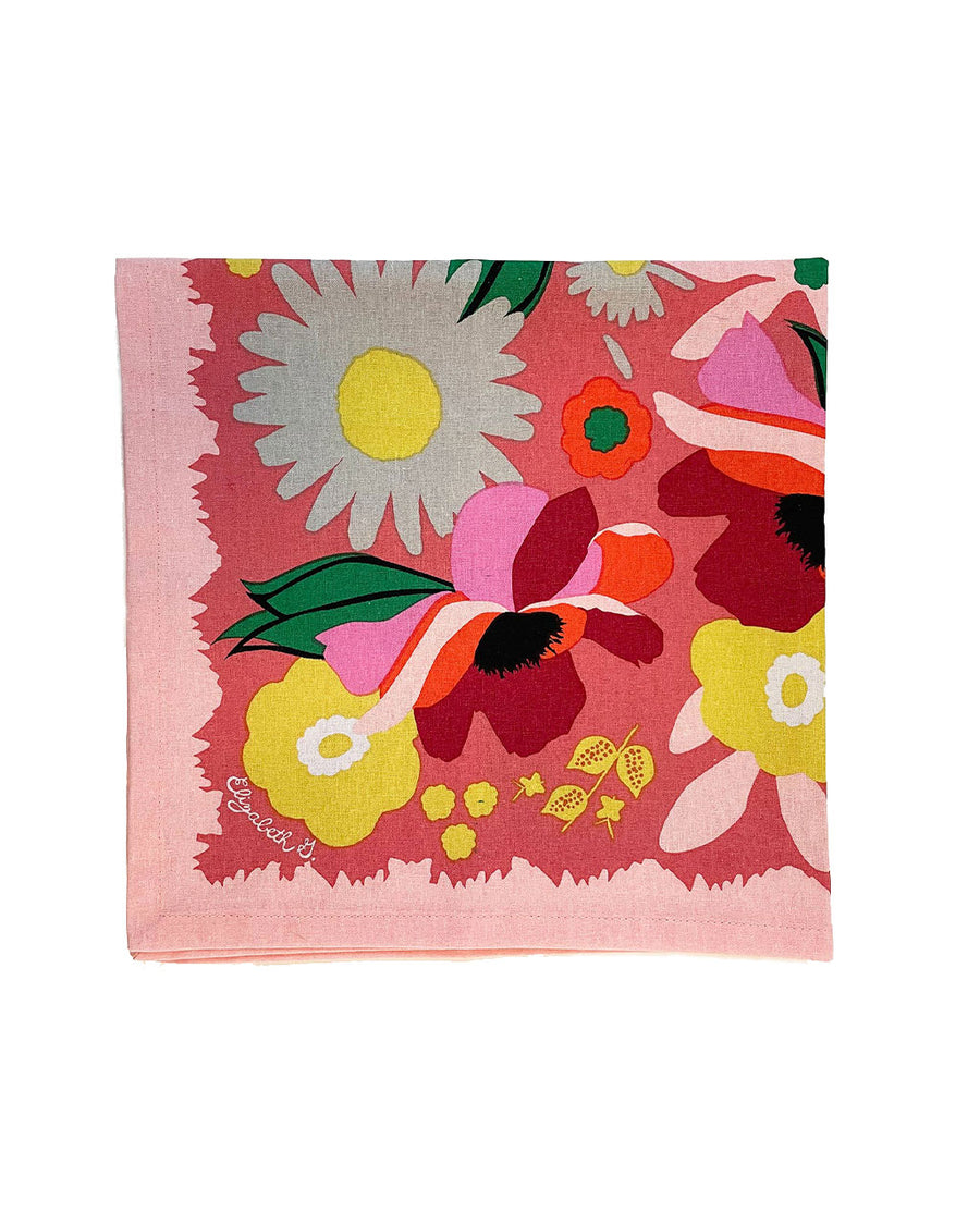 pink napkin with colorful abstract floral print