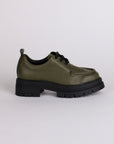 side view of olive green leather tie shoes with black lug sole