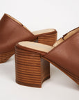 stacked heels on tan clogs
