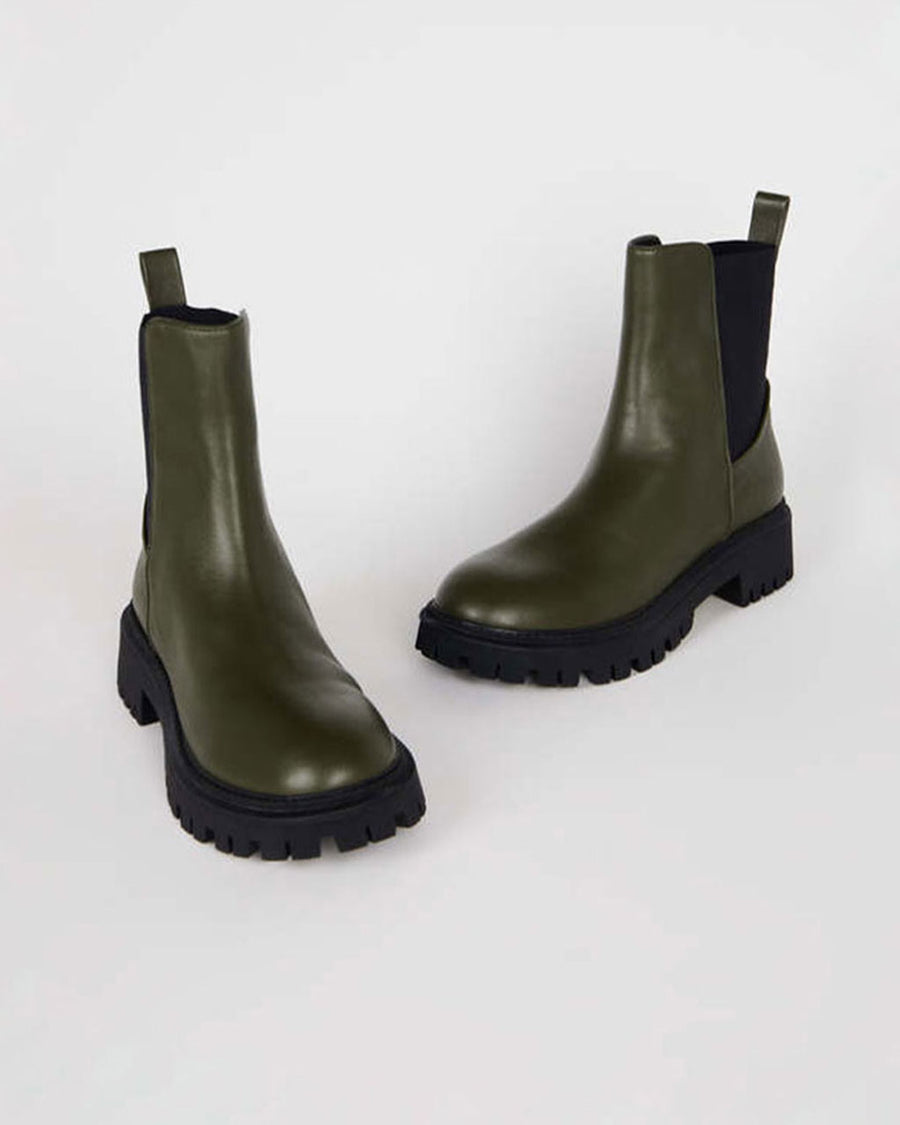 hunter green chunky sole boots with black elastic sides