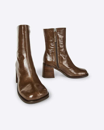 brown heeled tall boots with interior zipper and shiny leather