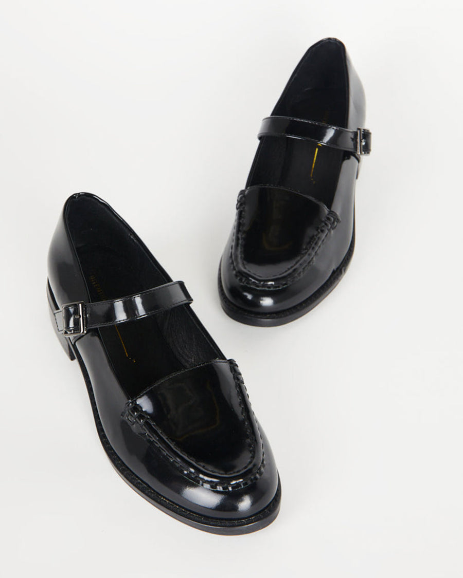 black shiny leather loafer shoe with buckle and strap