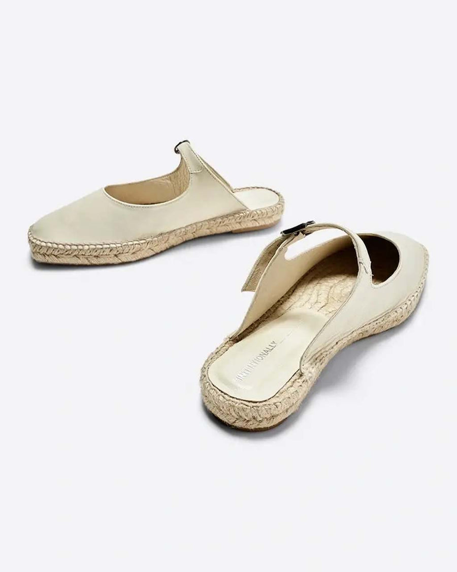 back and front view of cream pearl slip on with mary jane buckle and espadrille soles