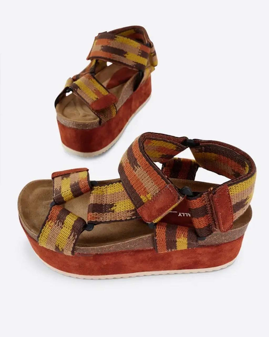 yellow, orange and brown print platform sandals with chunky chestnut sole