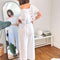 back view of model wearing off white cropped short sleeve top and matching wide leg pants