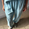 model wearing sky blue cotton balloon pants and matching t-shirt