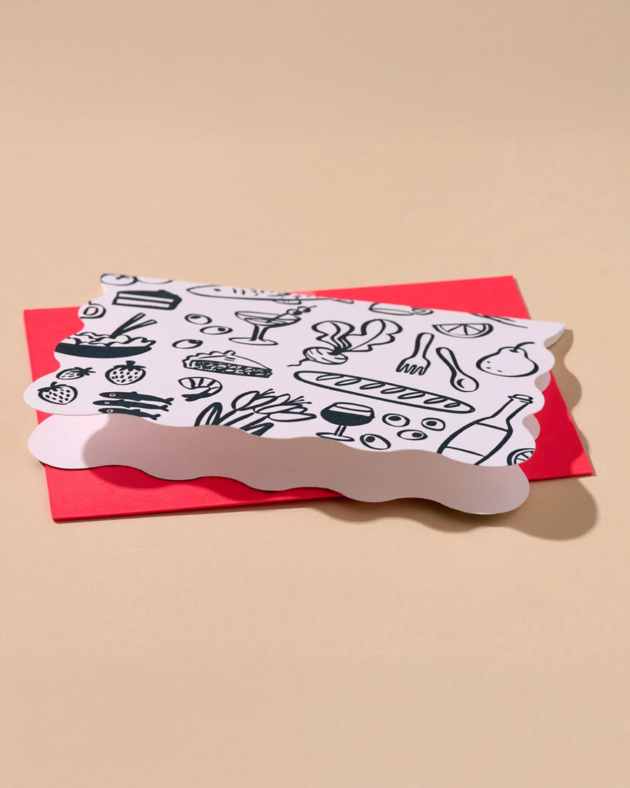 inside of set of 10 blank cards with sketched food print and red envelopes