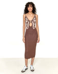 model wearing brown knit bodycon midi dress with cut out butterfly design at the bust