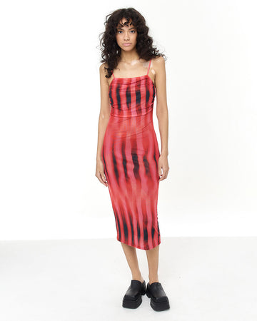 model wearing red and black midi slip dress