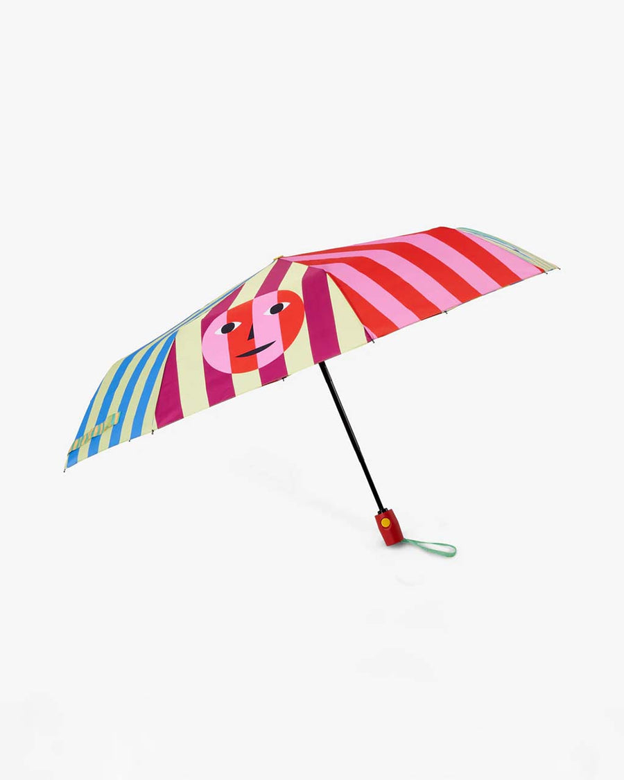 colorful stripe umbrella with faces throughout the panels
