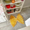 farfalle pasta shaped rug in kitchen